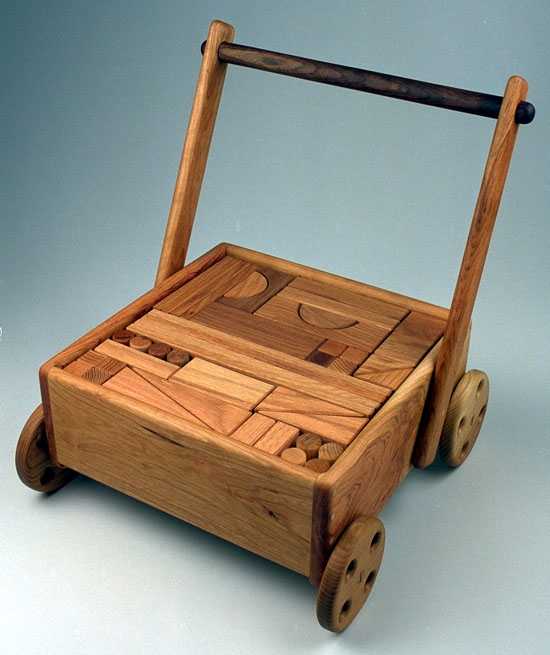 Block wagon with 100 unit blocks of red oak wood.