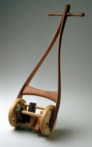 A wooden Clacker of Wisconsin hard woods by john michael linck from woodentoy.com