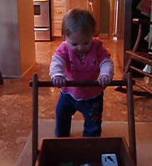 Lucy walking with block wagon toy